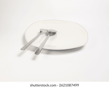 Minimalist Dining Setting with Elegant Plate and Silverware on White Background