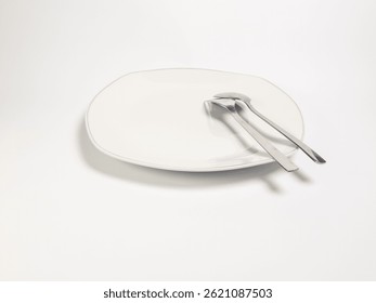 Minimalist Dining Setting with Elegant Plate and Silverware on White Background