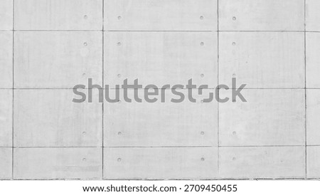 Minimalist flat concrete surface with subtle lines and screws, ideal for texture backgrounds or architectural design elements.
