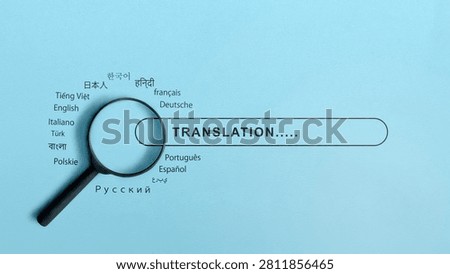 Minimalist flat lay of a magnifying glass on a translation search bar surrounded by world languages on a light blue background