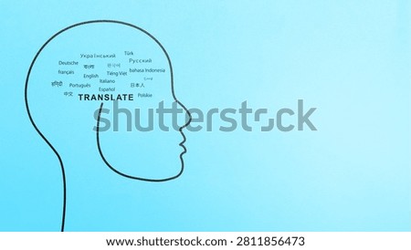 A minimalist line art illustration of a human head profile on a blue background, filled with various languages and the word TRANSLATE symbolizing multilingualism and cognitive process