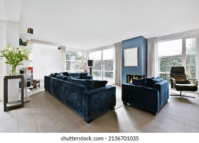 Minimalist Living Room With Blue Velvet Sofa