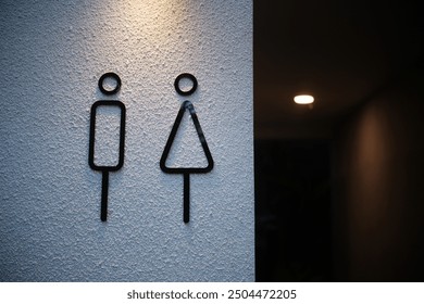 Minimalist modern restroom icon signs design for men and women in public areas