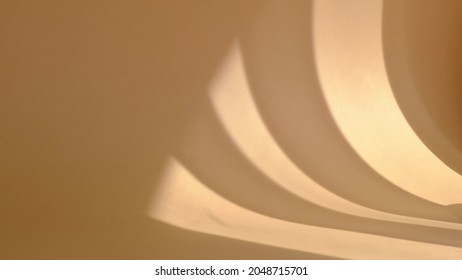 minimalist screensaver. Morning sun lighting the room, shadow background overlays. beige wal