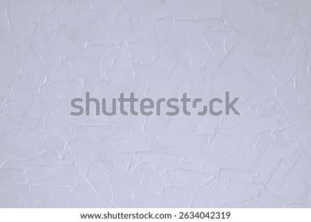 A minimalistic abstract artwork created using gesso and acrylic paint on canvas. Subtle textures and strokes form a monochrome composition, offering depth and movement in a serene tone.