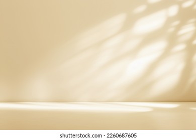 Minimalistic abstract gentle light beige background for product presentation with light andand intricate shadow from the window and vegetation on wall.