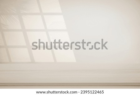 Minimalistic abstract gentle light beige background for product presentation with light and shadow of window and leaf curtains on wall. Pastel cream watercolor concrete wall old on floor wood parquet.