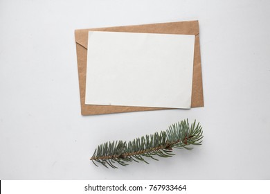 Minimalistic Christmas Card Mockup With Fir Branch, Cone, Envelope