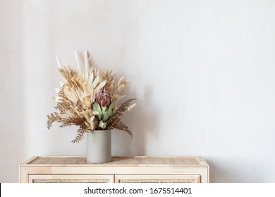 Minimalistic Composition Of Dried Flowers In Cylindrical Ceramic Vase As Home Decoration. 