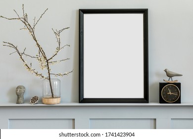 Minimalistic Concept On The Shelf With Black Mock Up Photo Frame, Dired Flower In Vase, Black Clock And Elegant Personal Accessories At Stylish Home Interior.