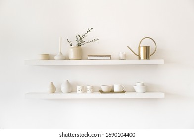 Minimalistic. Cozy light home style. Scandinavian interior. Dishes on white shelves. White details in the interior.  - Powered by Shutterstock