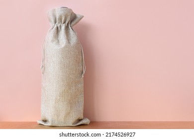 Minimalistic fall mockup with wine bag blank pink background. Subtle wine bag mock up. Autumn sale mock up, copyspace. Ecology concept. - Shutterstock ID 2174526927