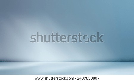 Minimalistic simple abstract light blue background for product presentation. Shadow and light from windows on wall.