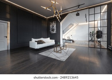 minimalistic stylish interior of luxury apartment with white stylish bedroom and dark living room. modern apartments with an open layout during the day without people and amazing sun rays - Powered by Shutterstock