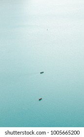 Minimalistic Two Boats In Quiet Waters On The Lake, Aerial View