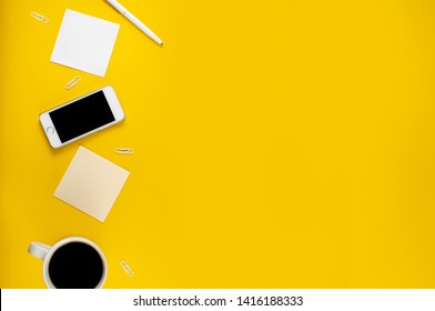 Minimalistic workplace concept, with a smartphone, pen and business work records on a dark background. Image digital, marketing, design agency. Top view. Flat lay style - Powered by Shutterstock