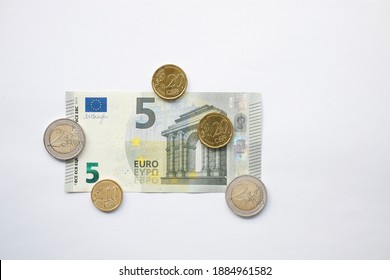 The Minimum Wage In Germany Will Rise To 9.50 Euros On January 1, 2021, Euro Money Lay On A White Background With Space For Text, No Person