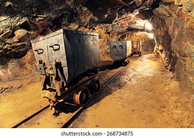 Mining cart in silver, gold, copper mine - Shutterstock ID 268734875
