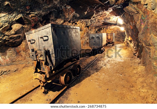 Mining cart in silver,\
gold, copper mine
