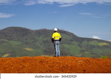 Mining Construction Worker On Mountain Top In Africa