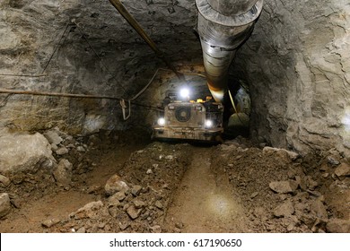 Mining Industry. Metal Ore Mechanical Transportation.