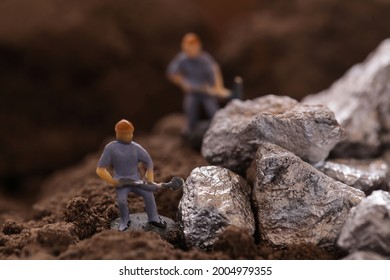 Mining of Nickel, Cobalt. Miniature worker mining metal zinc and silver. Mining business or Department of Mineral Resources.