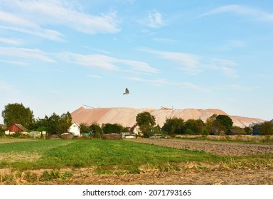 Mining Of Salt And Potassium Salts. Summer Landscape Of The Salt Mountains On The Blue Sky Background. Extraction Of Silica From The Ground. Mining Industry Landscape. Potassium Salt Background.
