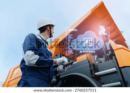 Mining site worker using tablet with AI technology assistant with chat cloud overlay for mining equipment monitoring industrial.