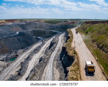 Mining Truck, Aerial View, Big Quarry And Special Equipment For Working In Quarries. Crushed Stone Plants Territory From Above.