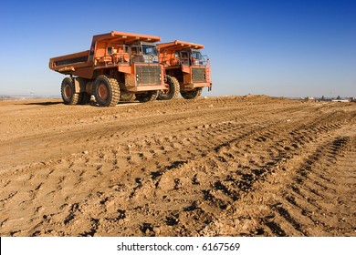 Mining Trucks At Worksite