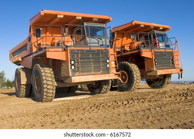 mining trucks at worksite