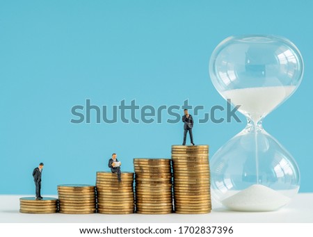 miniture model about Time and Business strategy
, money saving, banking deposit, investment services business and Time management.