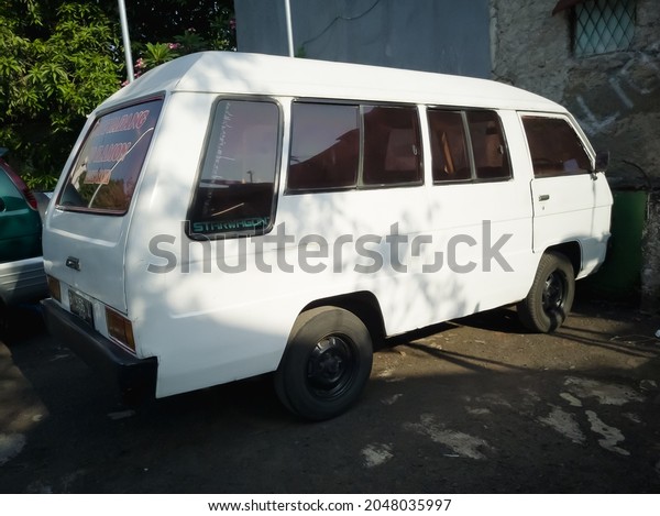 Minivan for West Sumatran food delivery from
Japanese brand, Mitsubishi ,variant Colt L300, year 1993 release.
Saturday, September 18, 2021. Tegal Parang ward, South Jakarta,
Indonesia.