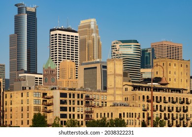 MINNEAPOLIS, MINNESOTA, USA - JUNE 30, 2021: - The skyline of downtown Minneapolis, Minnesota's largest city, viewed from the Stone Arch Bridge. - Shutterstock ID 2038322231