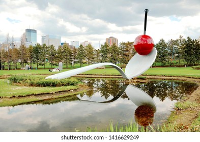 Minneapolis, Minnesota, USA - May, 07, 2011: Group Of Asian Traveler Or Friends  Sightseeing Or Relaxing On Weekend At Spoon Cherry Or Sculpture Garden