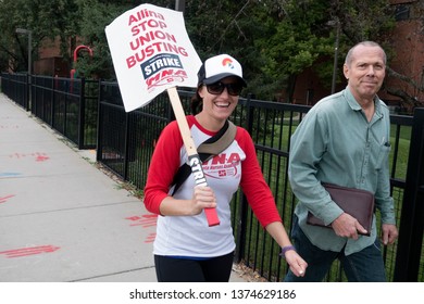 MINNEAPOLIS, MINNESOTA / USA - SEPTEMBER 09, 2016: Nurse Picketing Allina Health For Better Health Benefits Complaining About Union Busting On Sign. 