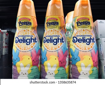 Minneapolis, MN - April 3, 2019: International Delight Coffee Creamer Bottles On Display At A Retail Store, In Peeps Marshmallow Limited Edition Flavor For The Easter Spring Holiday