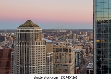 MINNEAPOLIS, MN - DECEMBER 2018 - A Medium Shot Of The SPS Tower In Downtown Minneapolis And Distant St. Paul Skyline During A Beautiful Winter Dusk