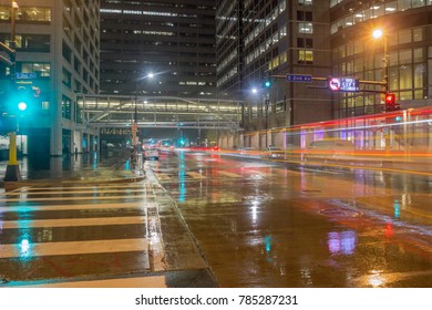 MINNEAPOLIS, MN - NOVEMBER 2017 - A Long Exposure Night Shot Of Bus Traffic Underneath The Hennepin County Government Building