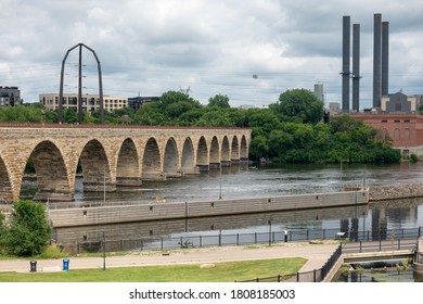 MINNEAPOLIS, MN - SEPTEMBER 11, 2019: View on Mississippi River and Stone Arch Bridge, Minneapolis, Minnesota.