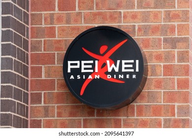 MINNEAPOLIS, MN, USA - DECEMBER 22, 2021: Pei Wei Asian Diner Exterior Sign And Trademark Logo.