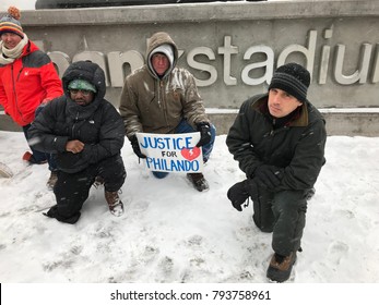Minneapolis, MN/ USA- January 14, 2018- 3 men unite in protest of our national anthem & seek justice for Philando Castille a man who was shot by Jeronimo Yanez when he was pulled over.