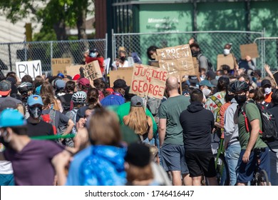 Minneapolis, MN / USA - May 31 2020: Protest and Riots Fueled by the Death of  George Floyd Under Police Custody. Crowd Gathers Outside Minneapolis 5th Precinct Police Station.