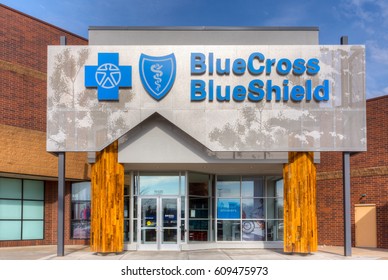 MINNEAPOLIS, MN/USA - MARCH 19, 2017: Blue Cross Blue Shield Exterior And Logo. Blue Cross Blue Shield Association (BCBSA) Is A Federation Of Health Insurance Organizations And Companies.