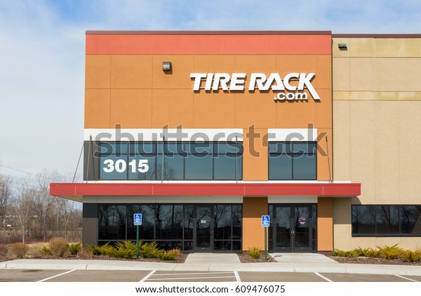 MINNEAPOLIS, MN/USA - MARCH 19,\
2017: Tireack tire distribution center exterior and logo.\
Tireack.com is a an on-line supplier of tires and automotive\
products.