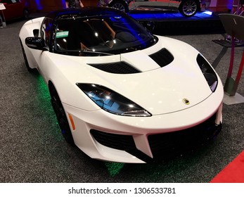 Minneapolis/MN/USA. March 14, 2018. A new white Lotus car on display at an auto show in Minnesota.