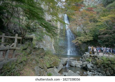 Minoo, Osaka, Japan - November 16 2018: Autumn maple leaves. Japan waterfall Minoo Park orange trail pathway cross country