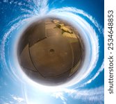 minor planet aerial panorama view from blue sky and white clouds on plowed field, ancient burial mound on sunny day