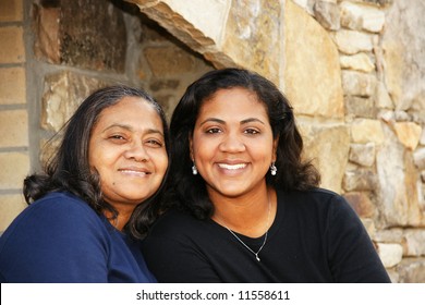 Minority Family Standing In Their Home