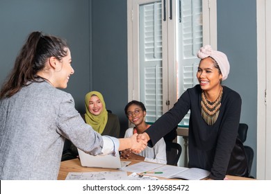 Minority muslim women working in a tech